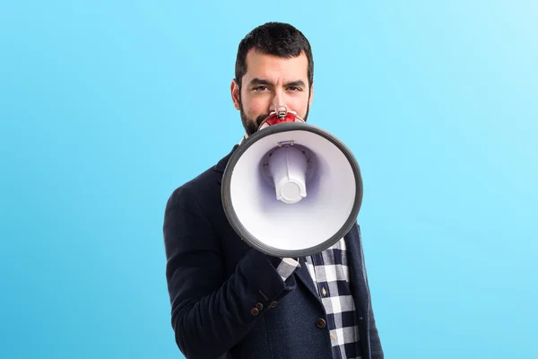 Homem gritando por megafone — Fotografia de Stock