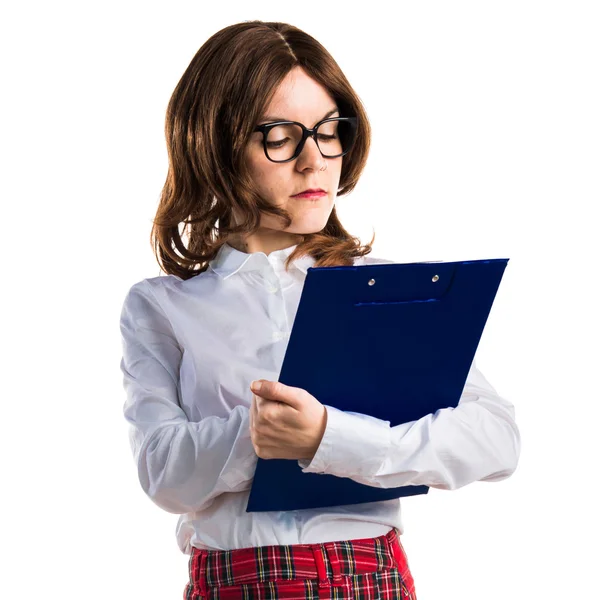 Estudante menina segurando notas escolares — Fotografia de Stock