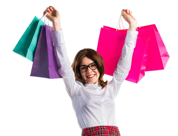 Woman with many shopping bags — Stock Photo, Image