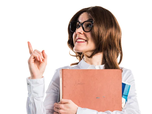 Studente ragazza holding several college notes — Foto Stock