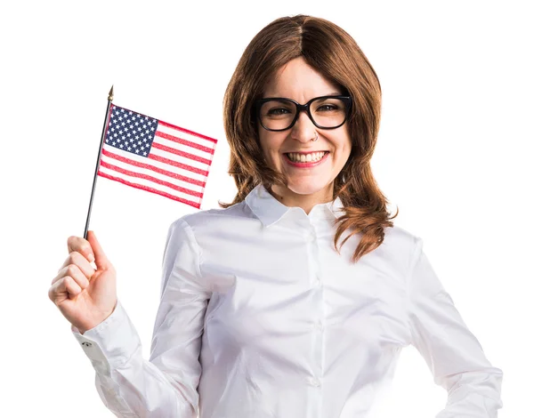 Studente ragazza che tiene una bandiera americana — Foto Stock