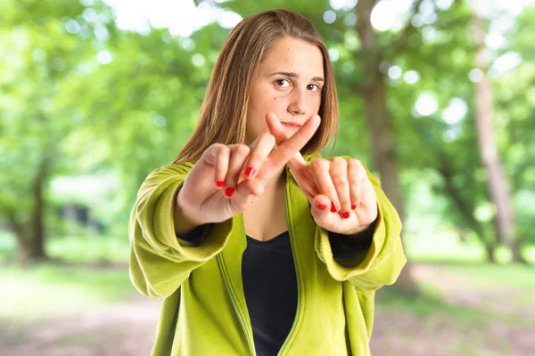 Girl doing NO gesture over white background — Stock Photo, Image