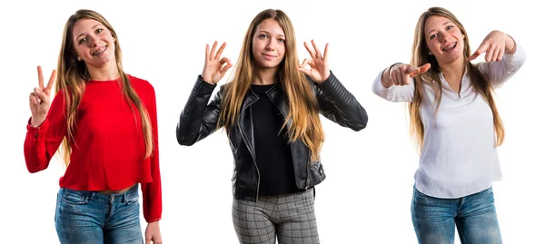 Teen girl making OK sign — Stock Photo, Image