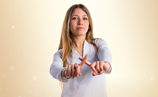 Teen girl doing NO gesture