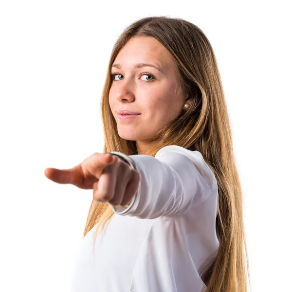 Ragazza adolescente che punta verso la parte anteriore — Foto Stock