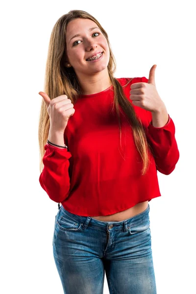 Menina adolescente com polegar para cima — Fotografia de Stock