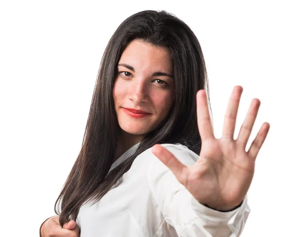 Brunette young girl in studio — Stock Photo, Image