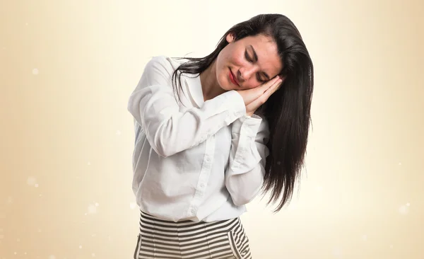 Girl doing sleep gesture — Stock Photo, Image