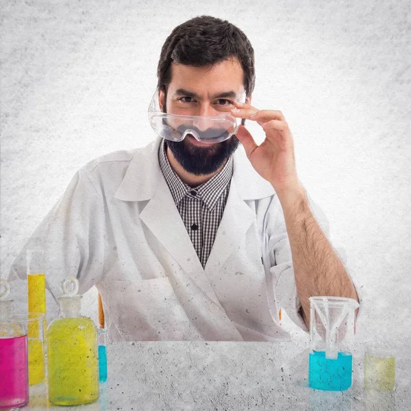 Scientist man with test tubes — Stock Photo, Image