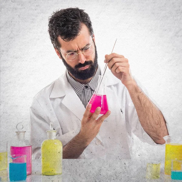 Scientist man with test tubes — Stock Photo, Image