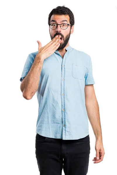 Handsome man doing surprise gesture — Stock Photo, Image