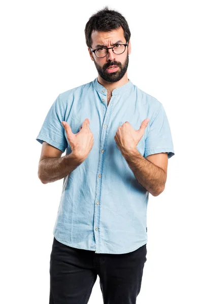 Bonito homem fazendo gesto surpresa — Fotografia de Stock