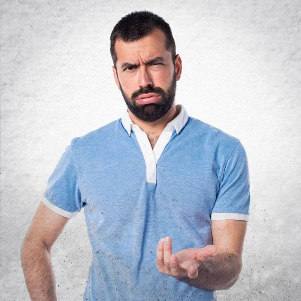 Hombre cansado con camisa azul — Foto de Stock