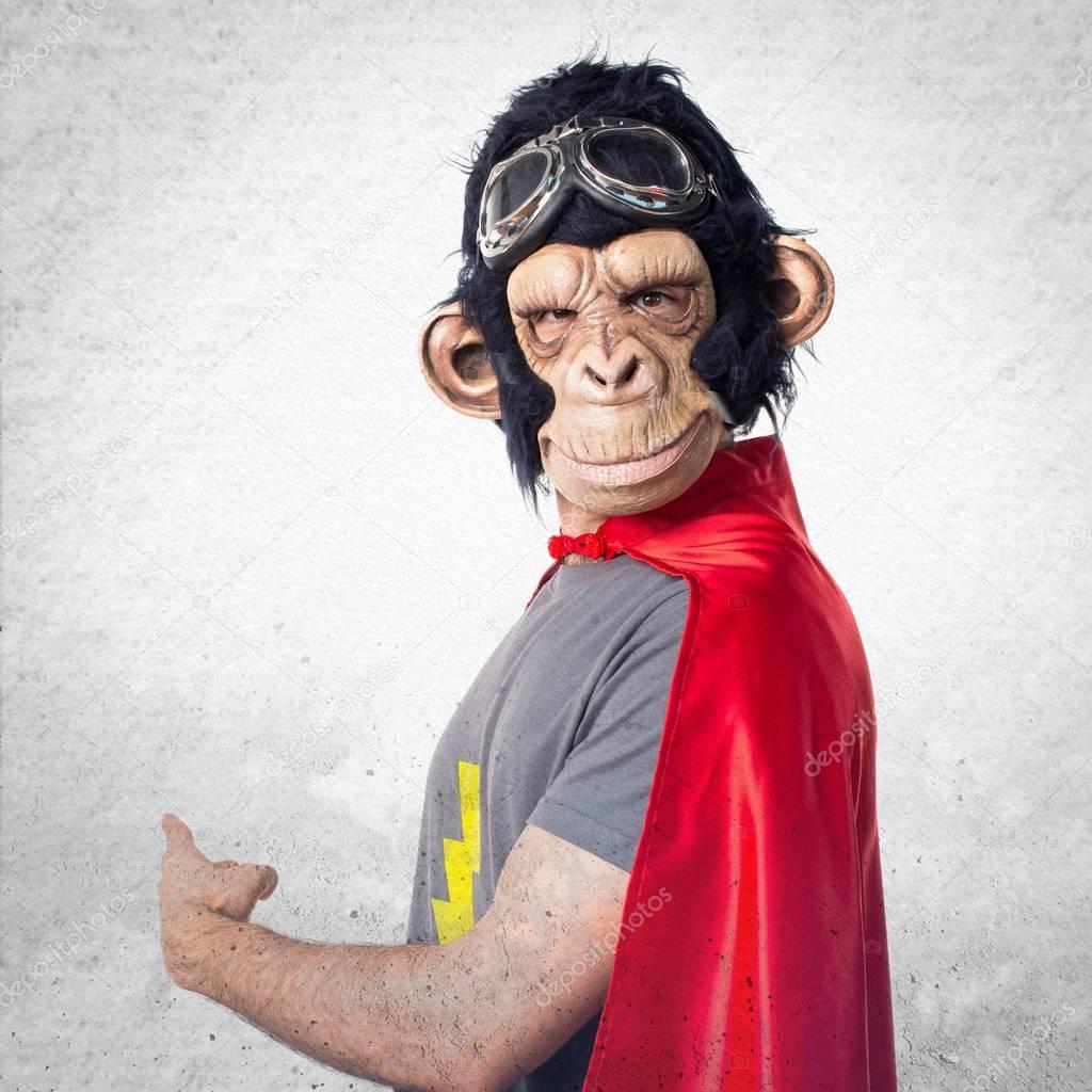 Superhero monkey man pointing back