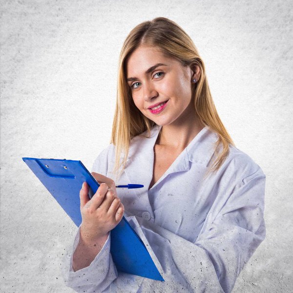 Doctor woman holding notes