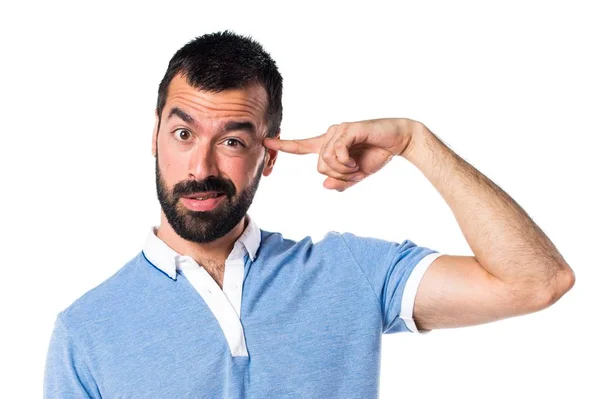 Mann mit blauem Hemd macht verrückte Geste — Stockfoto