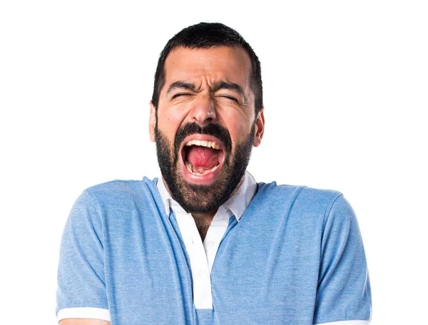 Homem com camisa azul gritando — Fotografia de Stock