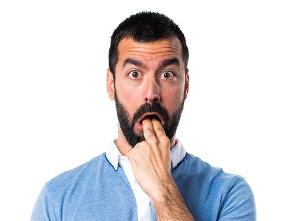 Hombre con camisa azul haciendo gesto de vómito —  Fotos de Stock