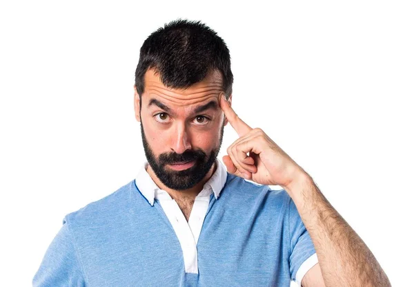 Hombre con camisa azul pensando — Foto de Stock