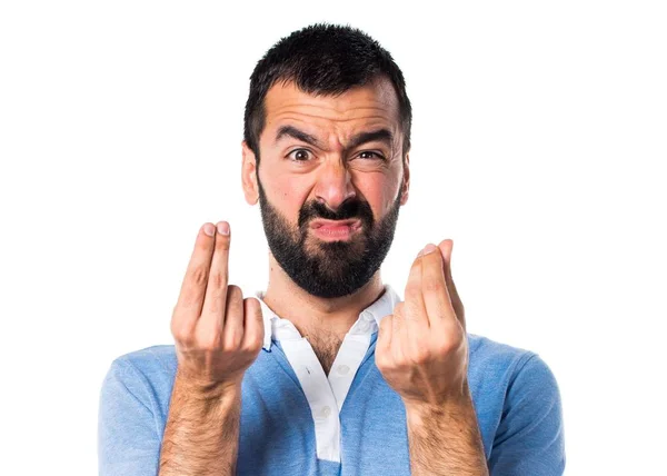 Homem com camisa azul fazendo gesto de dinheiro — Fotografia de Stock