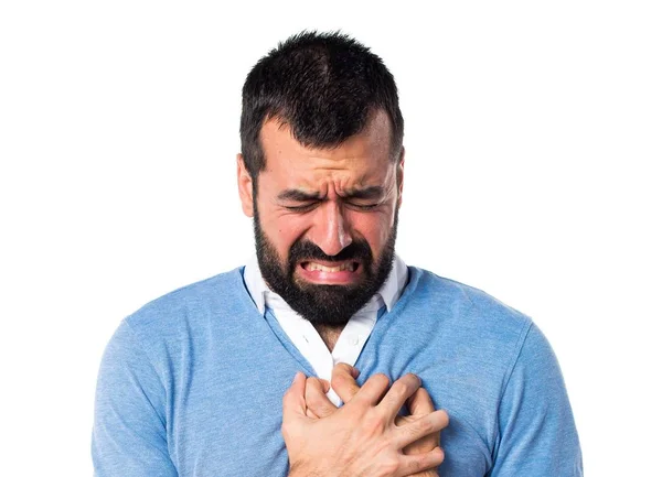 Hombre con camisa azul con dolor de corazón —  Fotos de Stock