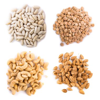 Kuruyemiş izole wite arka plan üzerinde kümesi