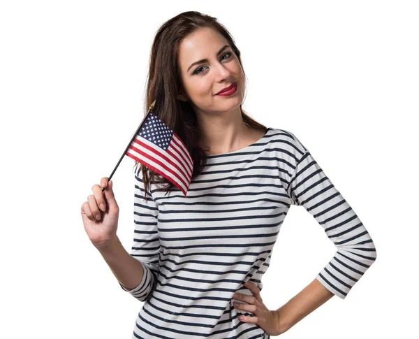 アメリカの国旗を保持しているかなり若い女の子 — ストック写真
