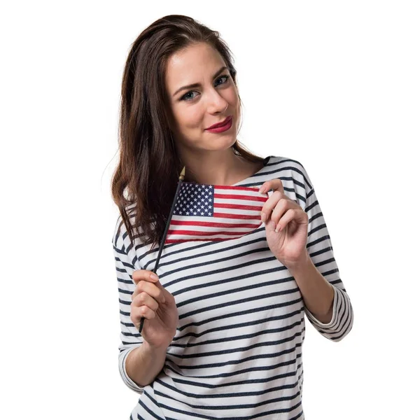 アメリカの国旗を保持しているかなり若い女の子 — ストック写真