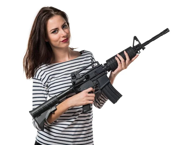 Pretty young girl holding a pistol — Stock Photo, Image