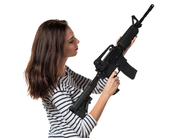 Pretty young girl holding a pistol — Stock Photo, Image