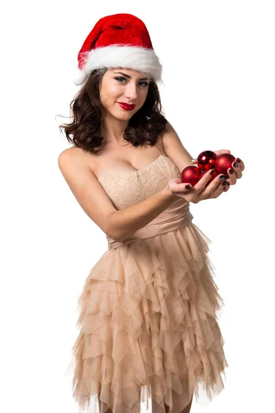 Jolie jeune femme tenant des boules de Noël — Photo