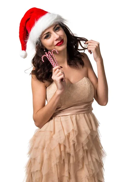 Mujer bastante joven sosteniendo caramelos de Navidad — Foto de Stock