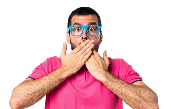 Hombre con ropa colorida haciendo gesto sorpresa — Foto de Stock