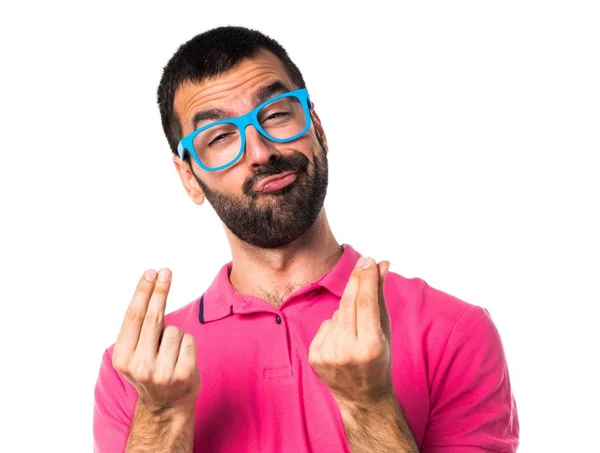 Άνθρωπος με πολύχρωμα ρούχα κάνουν χρήματα χειρονομία — Φωτογραφία Αρχείου