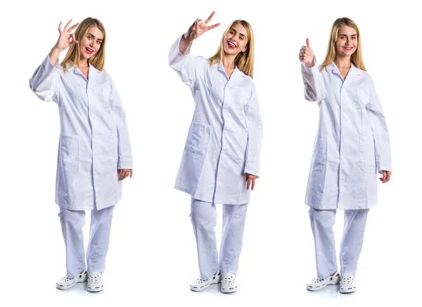 Doctor woman doing victory gesture — Stock Photo, Image