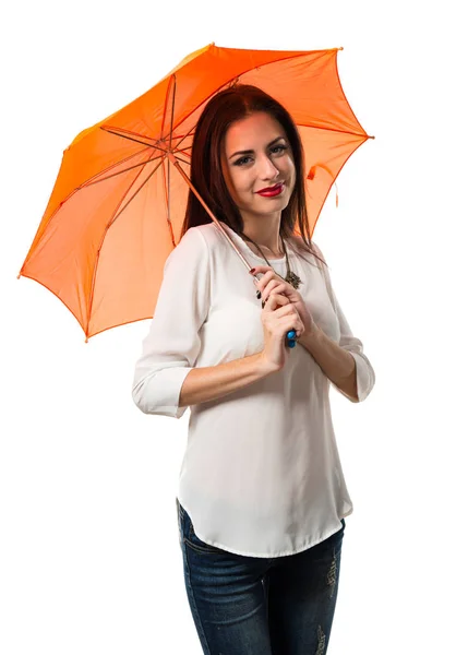 Menina bonita segurando um guarda-chuva — Fotografia de Stock