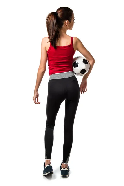 漂亮的运动位妇女抱着一个足球 — 图库照片