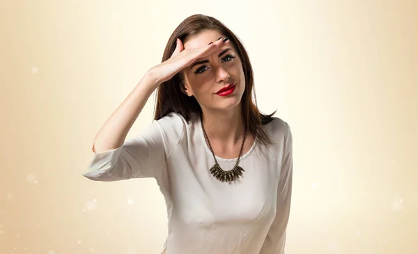 Pretty young girl showing something — Stock Photo, Image