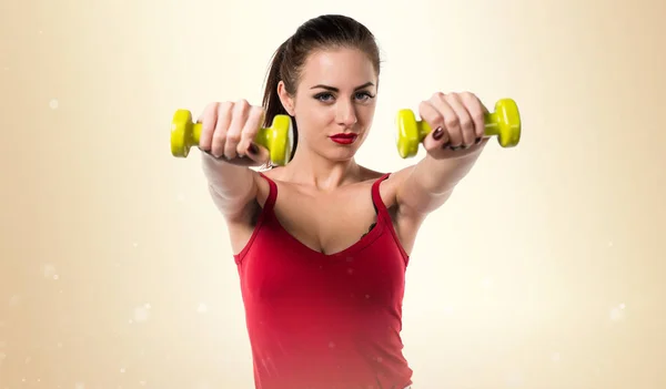 Pretty sport woman making weightlifting — Stock Photo, Image