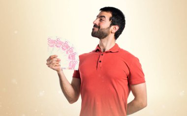 Yakışıklı adam bir sürü para alarak