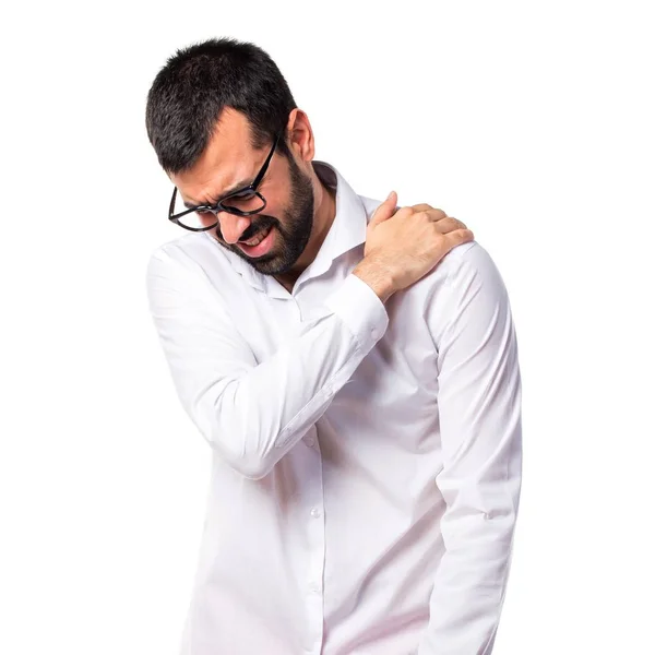 Handsome man with glasses with shoulder pain — Stock Photo, Image