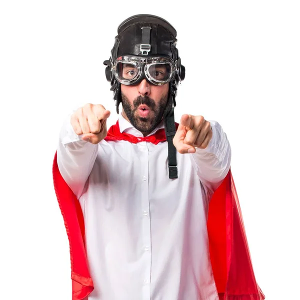 Crazy superhero manpointing to the front — Stock Photo, Image