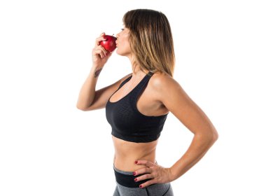 Bir elma yemek spor kadın