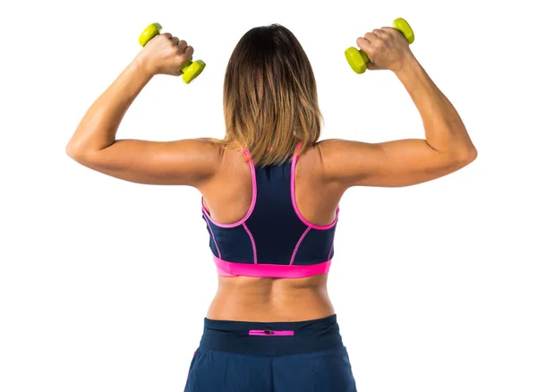 Deporte mujer haciendo levantamiento de pesas —  Fotos de Stock