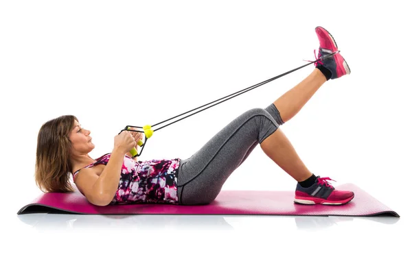 Sport woman stretching on mat — Stock Photo, Image