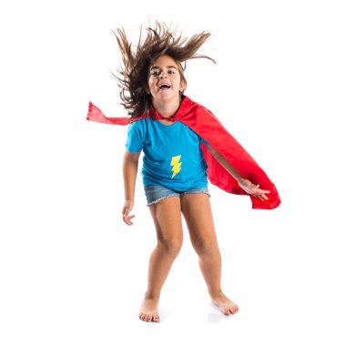 Sevimli küçük kız süper kahraman gibi giyinmiş