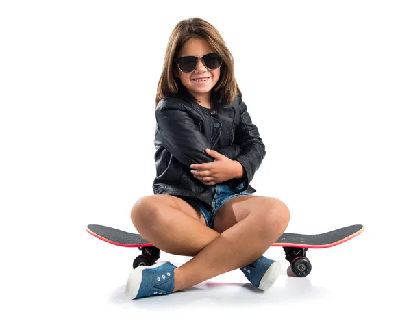 Cute brunette girl with skate — Stock Photo, Image