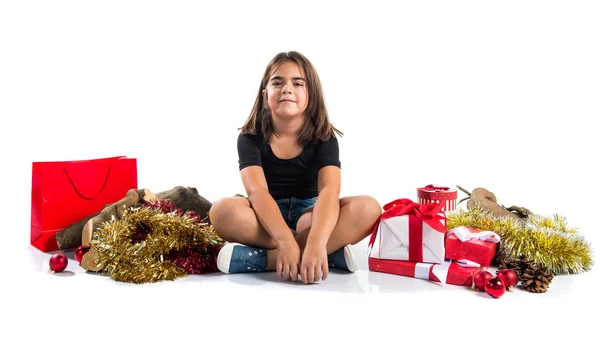 Little girl in christmas holidays with many gifts — Stock Photo, Image