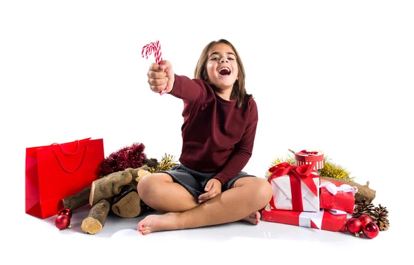 Little girl in christmas holidays with many gifts — Stock Photo, Image