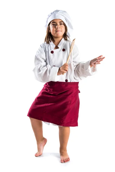 Kleines Mädchen wie ein Koch gekleidet — Stockfoto